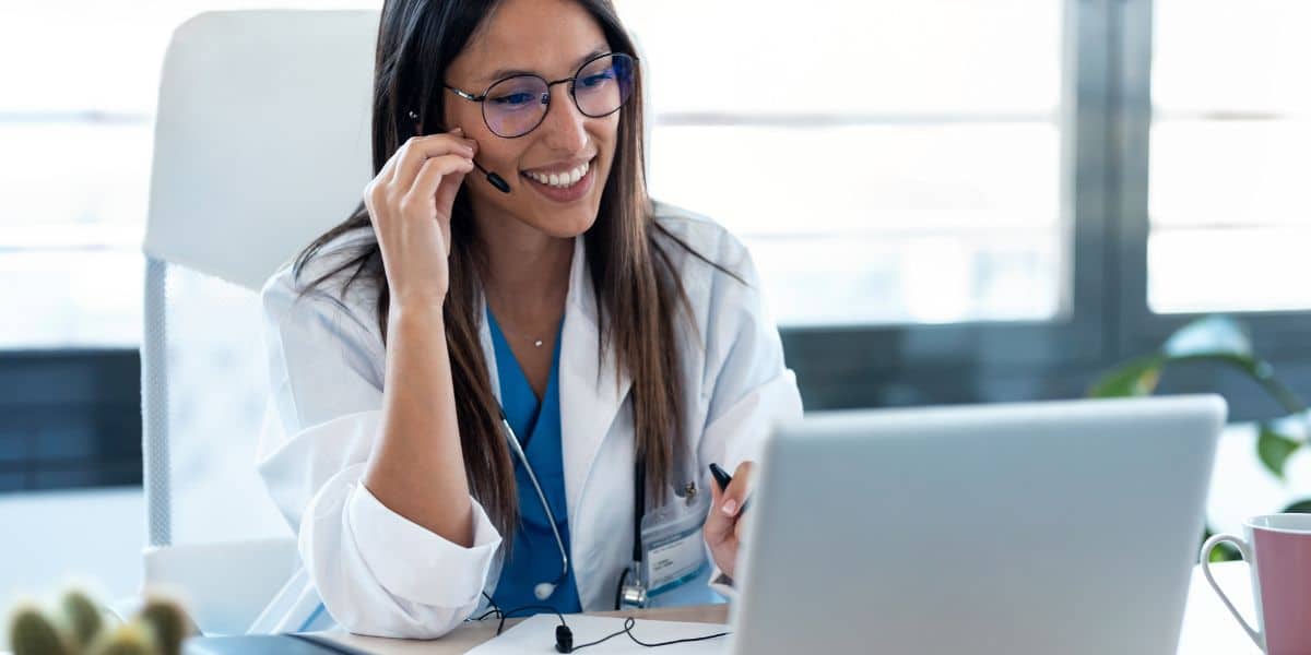 doctor talking with colleagues through a video call Prescription Through Video Visits