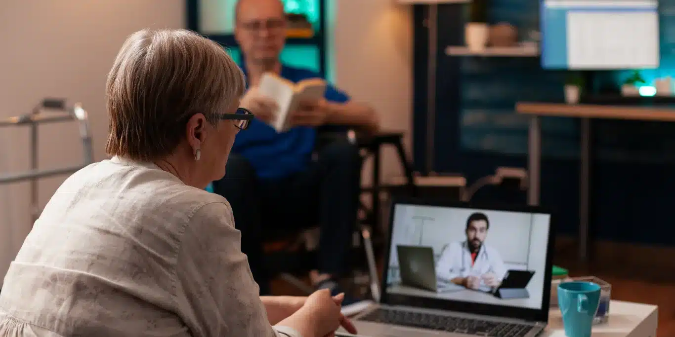 senior woman telemedicine consultation laptop senior woman telemedicine consultation laptop